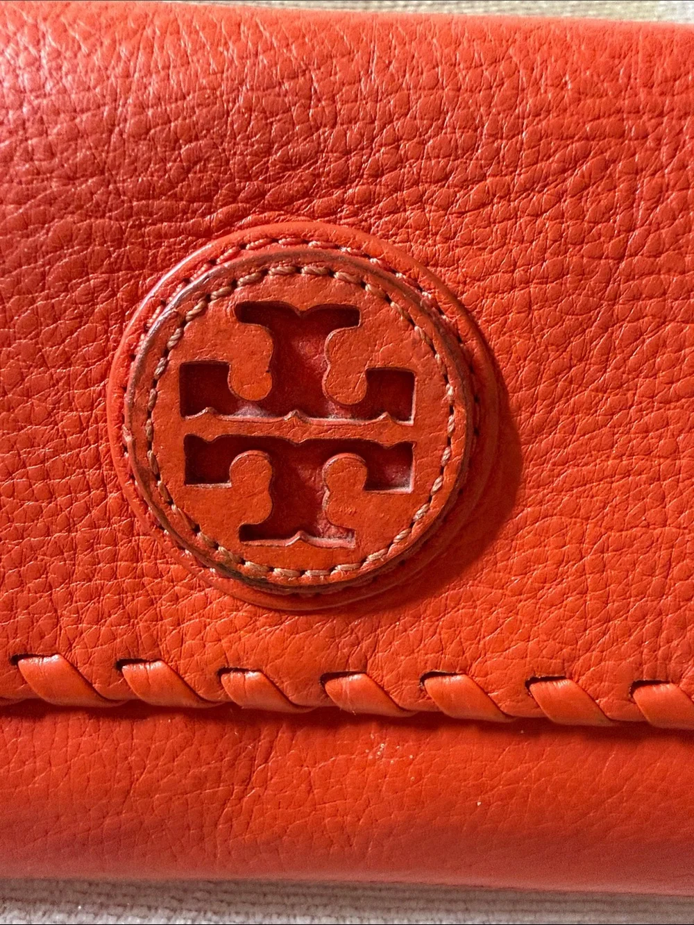 Tory Burch Orange Leather Wristlet with Logo Medallion